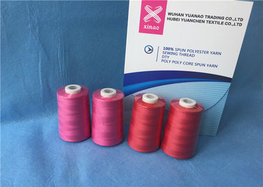 Китай Штапельное волокно 100% полиэстер шить пряжу ТФО, покрашенные нитки из волокон ядра полиэстера кольца поставщик